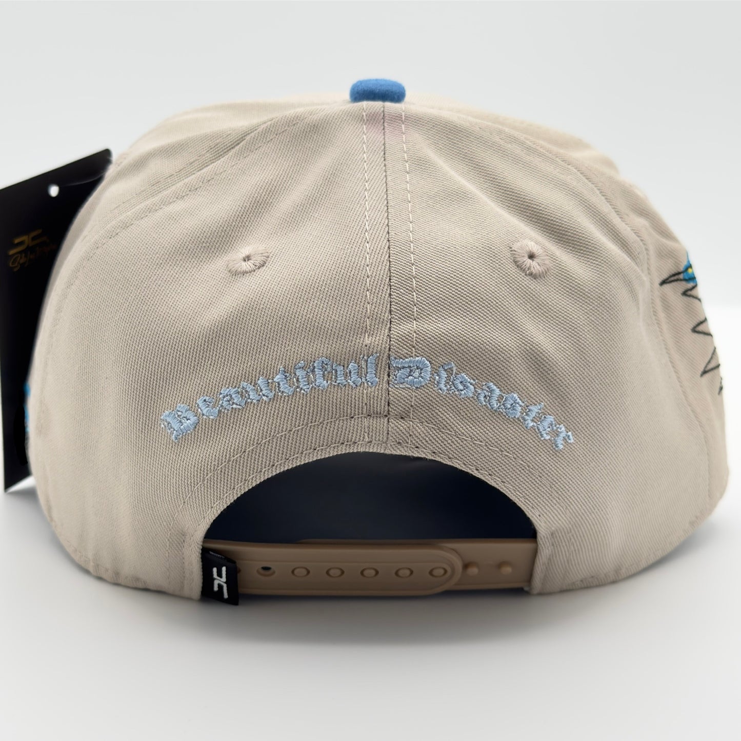 Beautiful Disaster Beige/Blue Sad Face Semi-Curved Cap